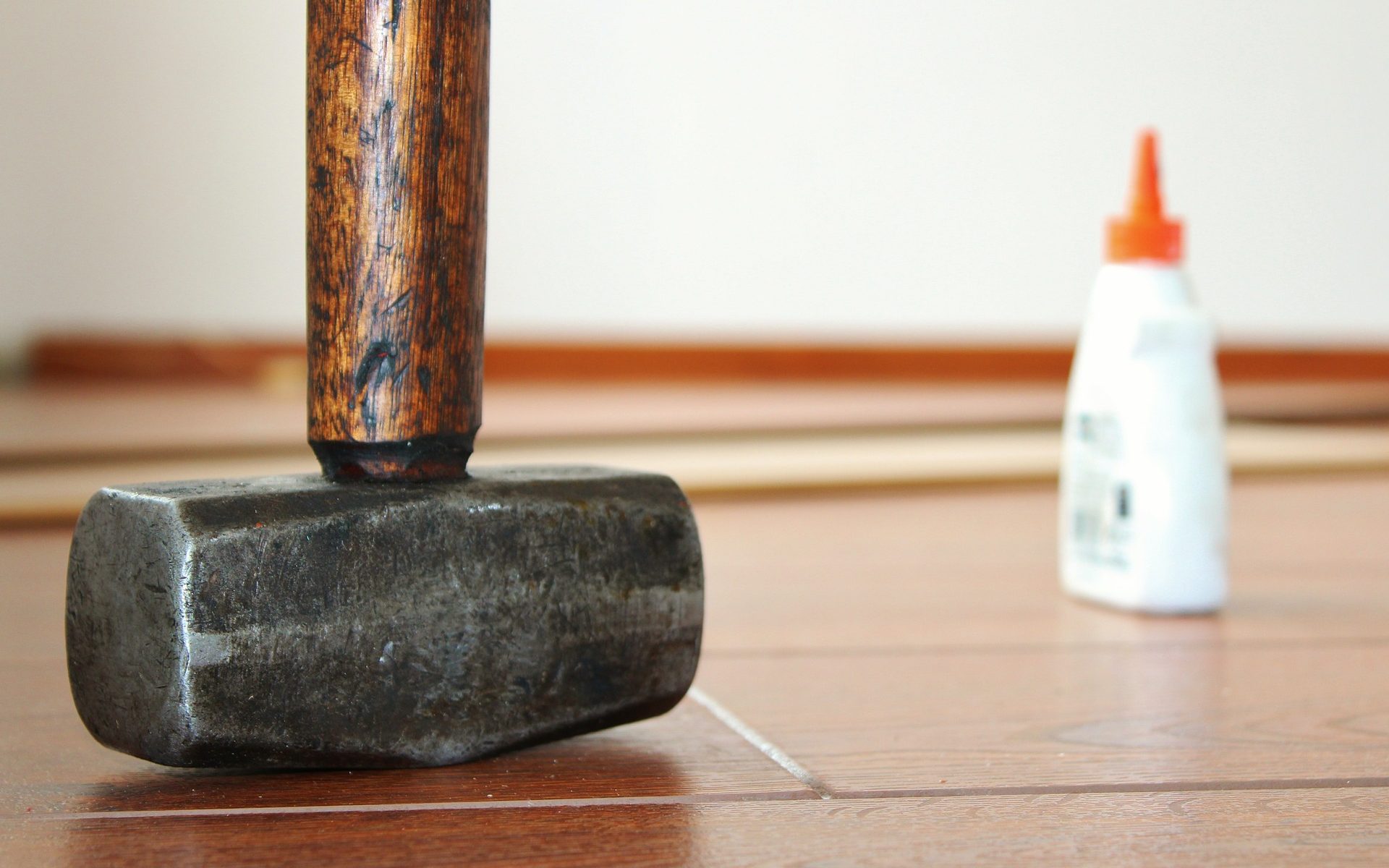 Hammer and adhesive